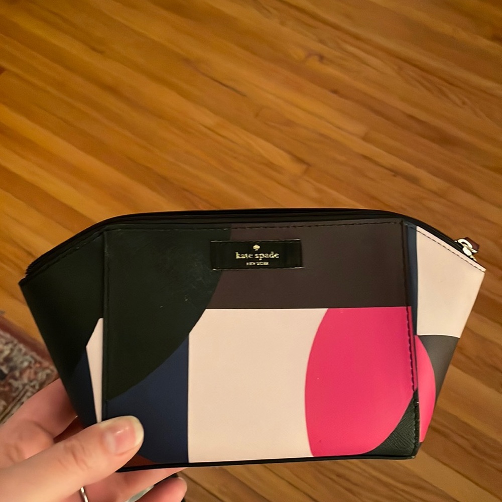 Kate Spade multicolored makeup bag.
